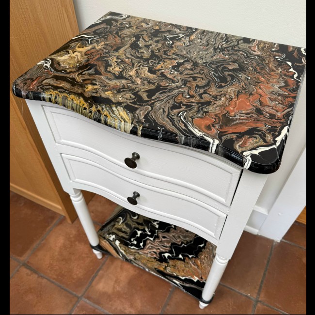 Earth tones end table with shelf and resin top